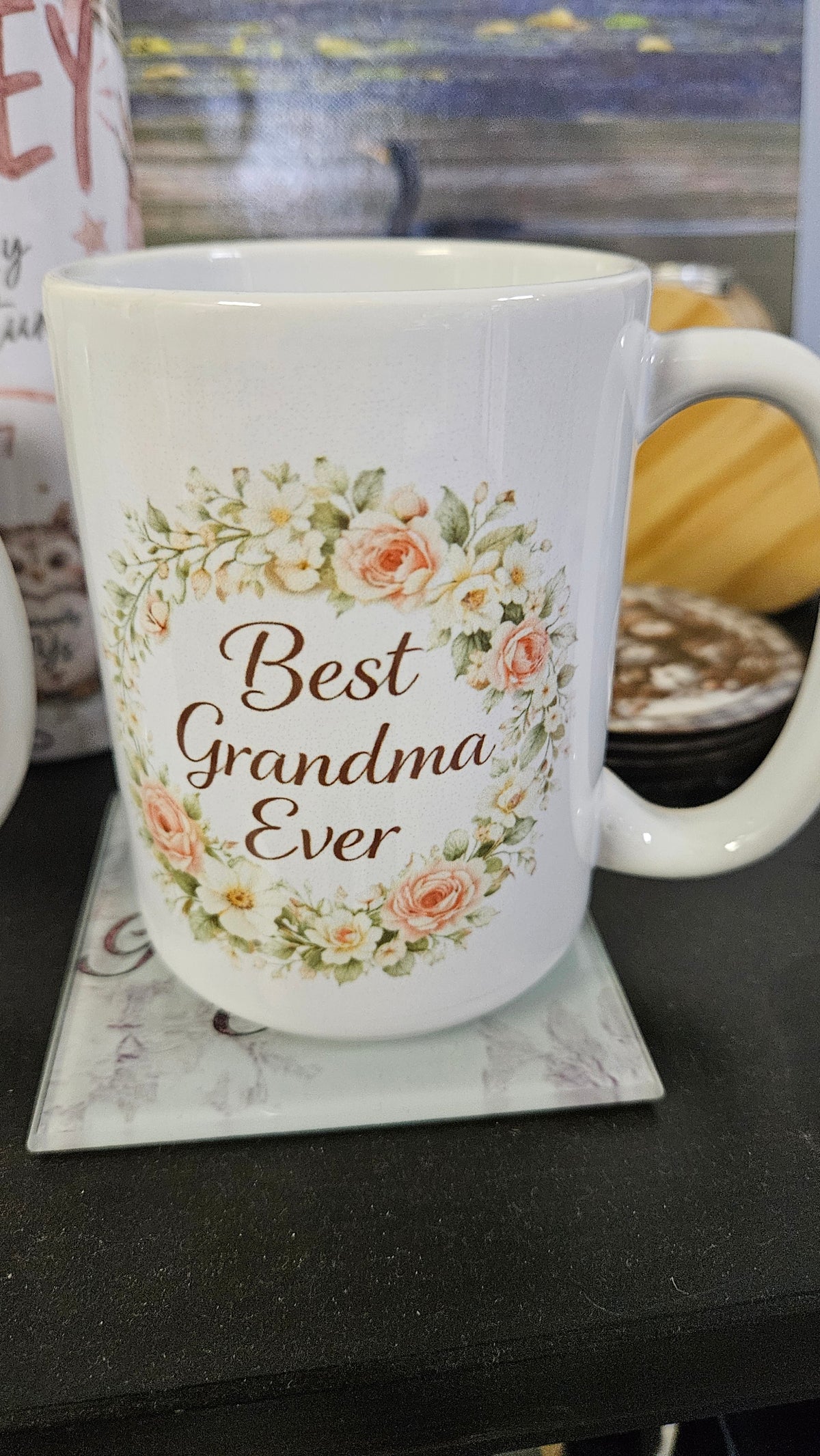 Best Grandma Ever 15 oz mug with a peach rose and cream floral wreath