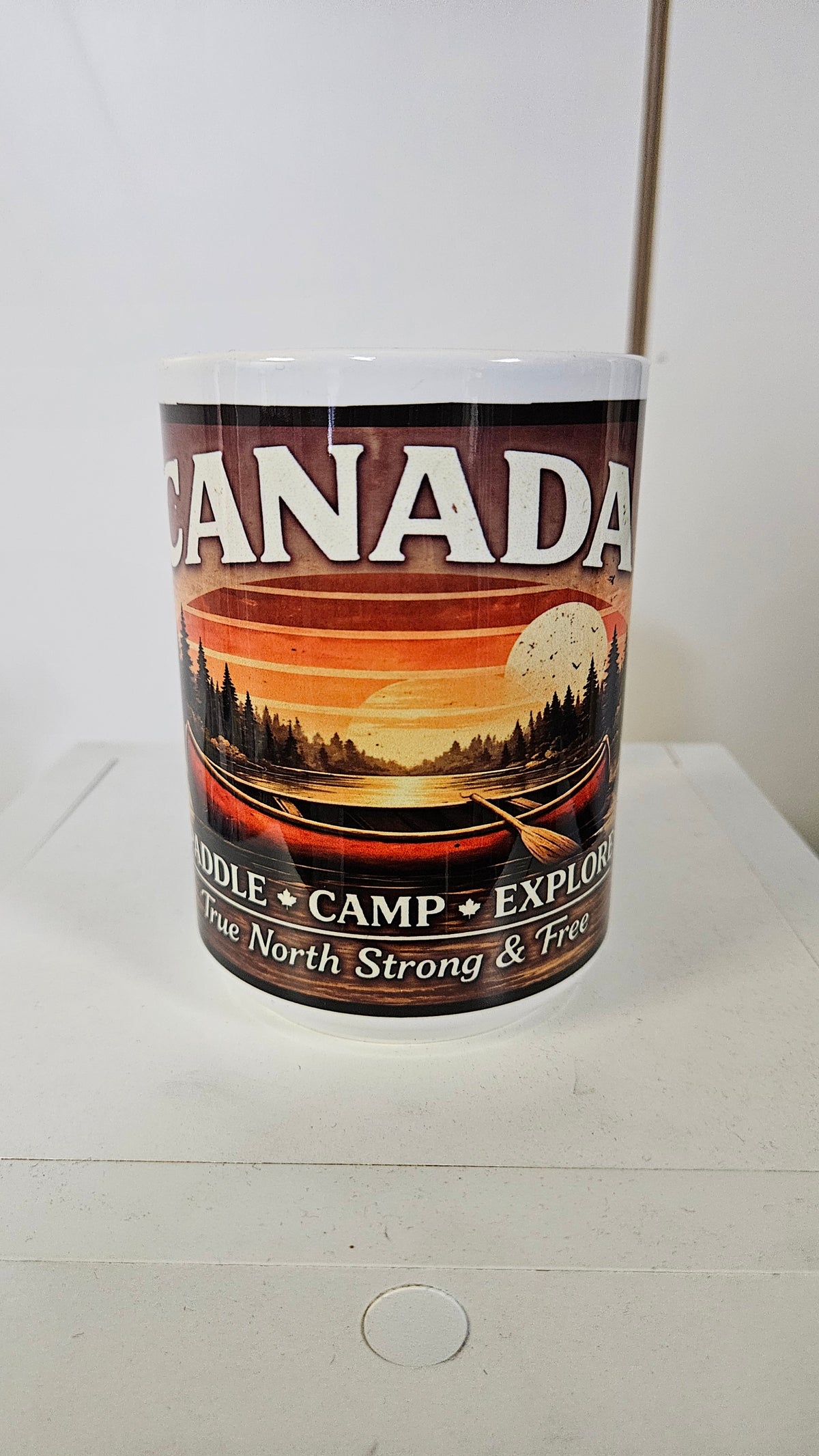 Canada mug with a red canoe at sunset, Paddle Camp Explore, True North Strong and Free