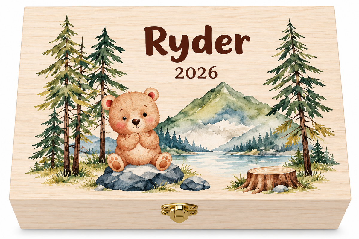 Personalized wooden baby keepsake box with the name Ryder, 2026 and a woodland bear cub, pine trees and mountain lake