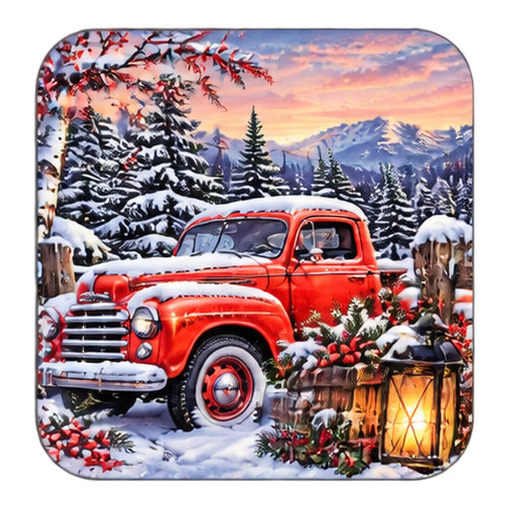 Winter coaster with a vintage red truck in the snow beside a glowing lantern